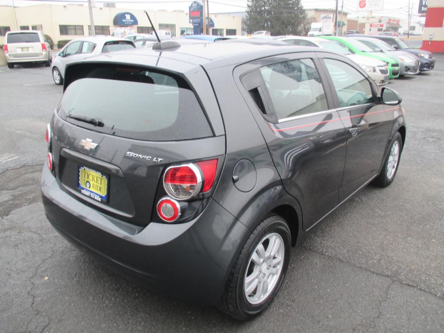 2016 GRAY Chevrolet Sonic LT Auto 5-Door (1G1JC6SG9G4) with an 1.8L L4 DOHC 24V engine, 6A transmission, located at 1254 Manheim Pike, Lancaster, PA, 17601, (717) 393-9133, 40.062870, -76.323273 - Photo#4